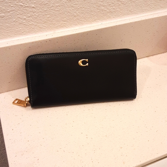 Coach Handbags - New coach calf leather long zip wallet
